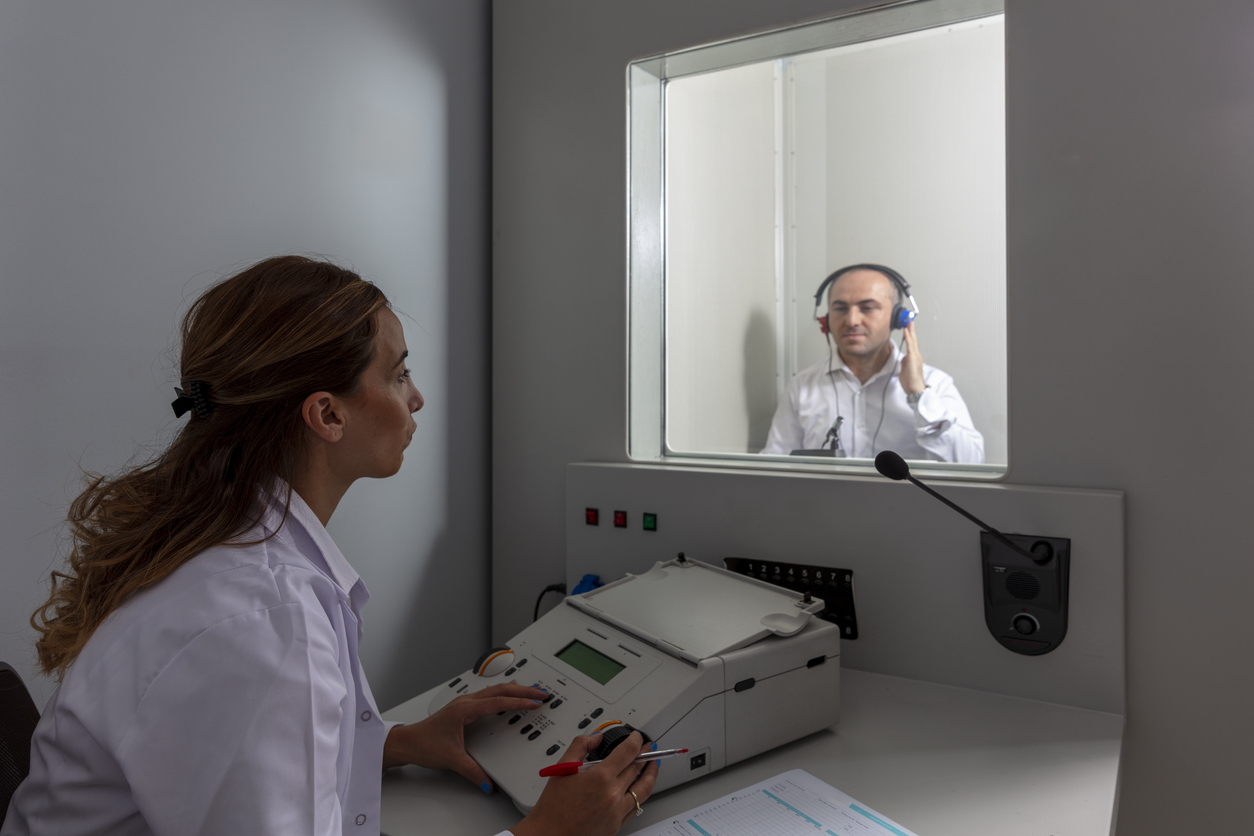 Man undergoing a hearing test.